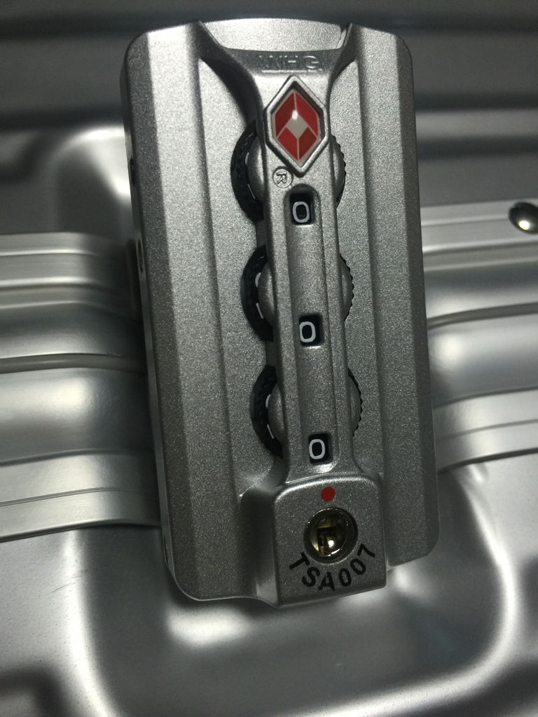 行李箱秘密锁怎么设置(行李箱的密码箱怎么设置)